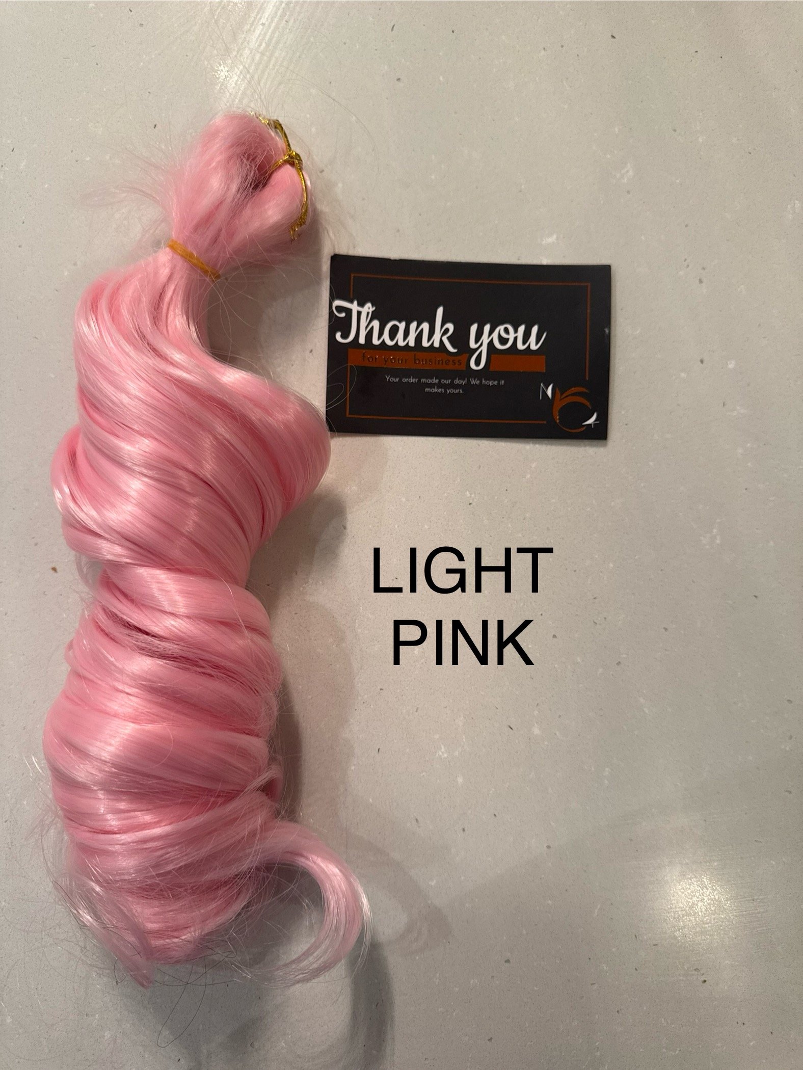 light pink French curl braiding hair light pink French curl braiding hair
